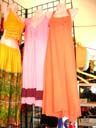 Online wholesale retail outlet supplies Sexy style orange summer dress in maxi length with tank top style straps and empire waist line