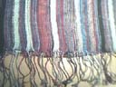 Import clothing dealer distributes vintage style Multi colored, stripped fashion scarf with tasseled hem