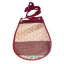 Designer handbag wholesale accessory supplier imports Oval shaped fashion purse with red border and multi print front. Has zippered pocket and long shoulder strap