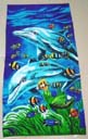 Beach accessory supply manufacturer distributes Fun aquarium designed beach towel with dolphin motif and colorful fish
