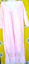 Intimate clothing catalog store manufactures Light pink, long sleeved night gown pajamas with ruffled center and lace design above breast