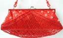 Womens high fashion import warehouse distributes Red sequin and bead evening purse with latched pocket and beaded shoulder strap
